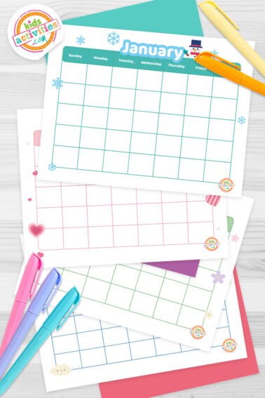 Black and white calendar printable on top of blue-green and purple sheets with assorted crayons on a dark grey background. printed pdf version from Kids activities blog.