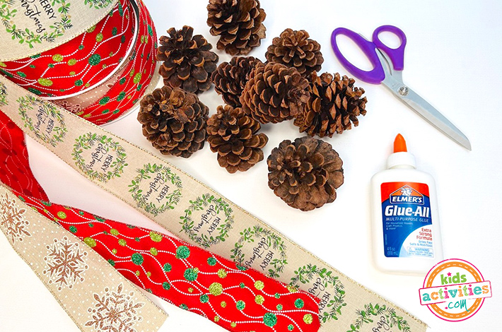 DIY Craft for Christmas - Kids Activities Blog - pine cones, scissors, glue, ribbon