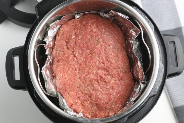 Step 5- place meatloaf rivet on top of potatoes - Instant Pot Meatloaf 