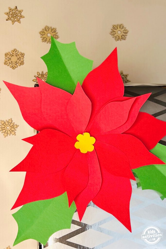 Make a christmas craft - poinsettia craft - Kids activities blog - step 3