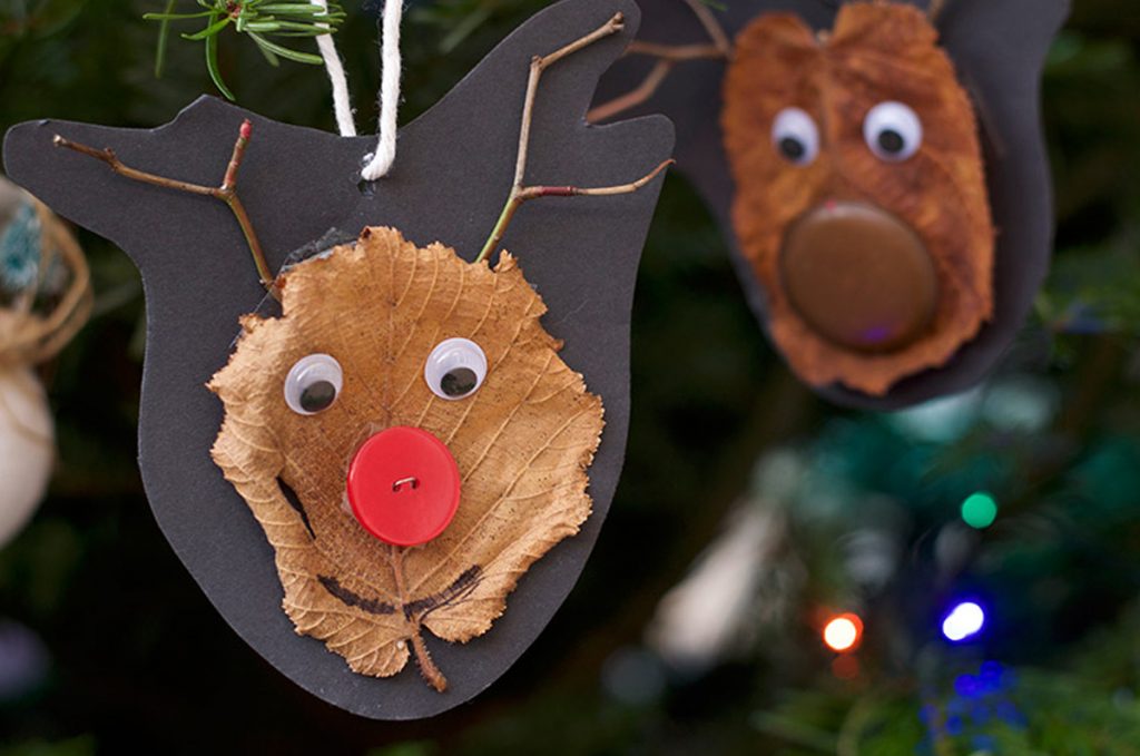 natural Christmas ornaments- Image shows a reindeer craft made with leafs.