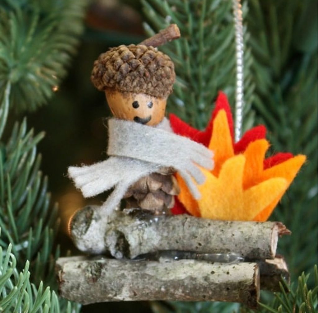 natural Christmas ornaments- Image shows an elf craft made with wood 