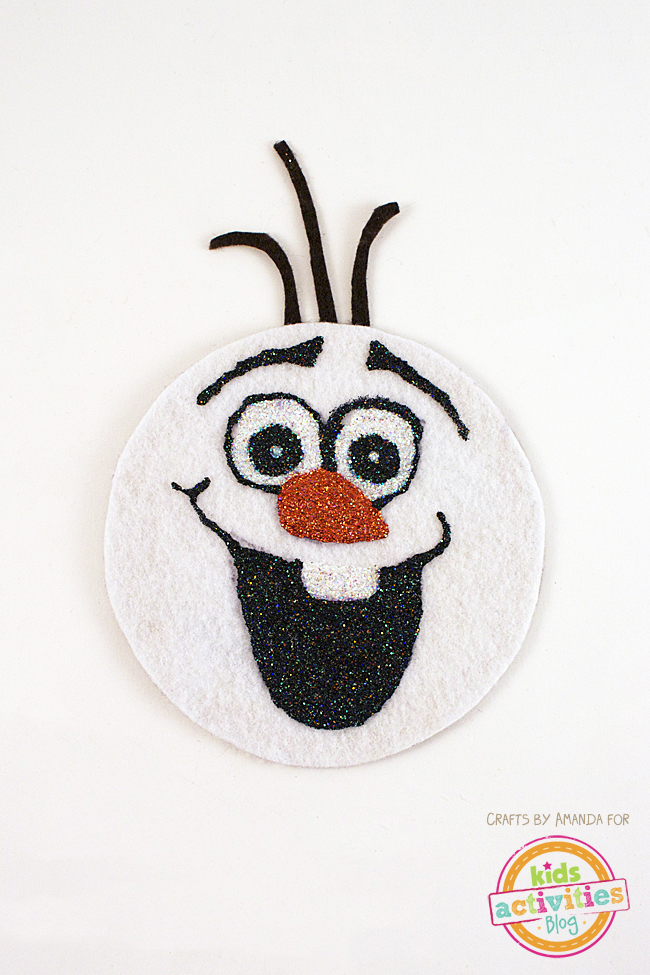 Olaf craft made with a cd and smiling with a carrot nose, glitter, hair, and a white background text: Make Olaf from a recycled CD - kid activities blog