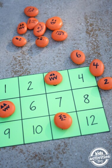 Halloween Math Activities with Painted Pumpkin Rocks