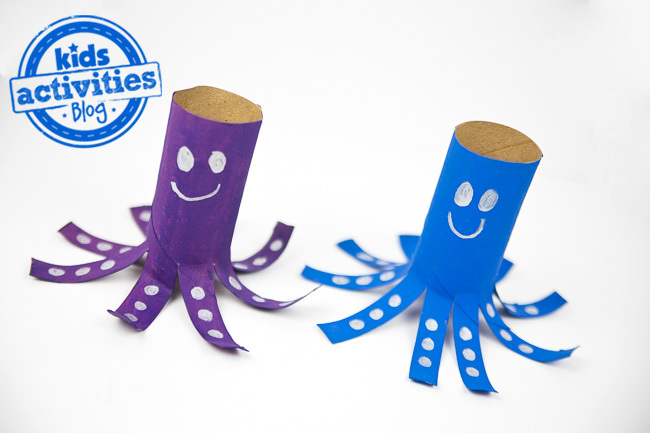 Toilet Paper Roll Octopus- toilet paper rolls painted purple, blue, with smiles, and polka dots, white, with legs cut into the paper toilet roll- kids activities blog